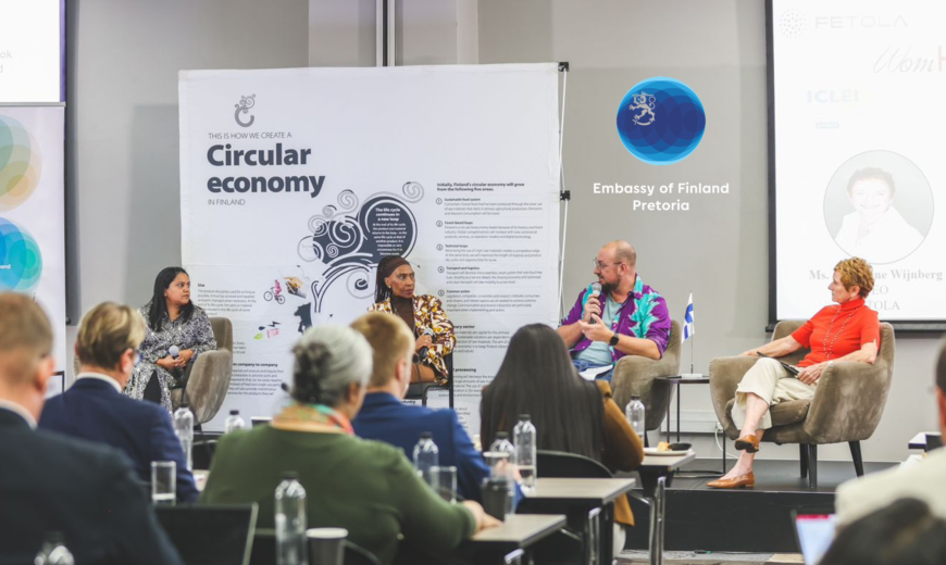 Panel discussion at the Circular Economy Dialogue 2026 with Embassy of Finland Pretoria signage in background